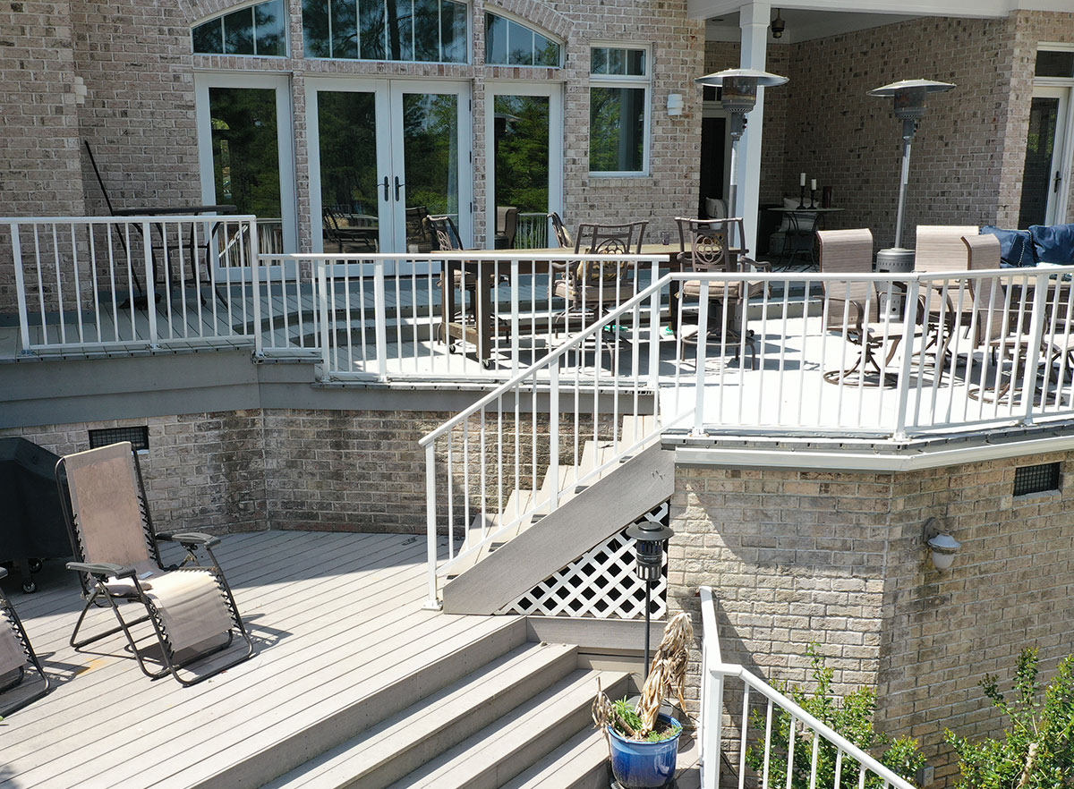 Image of multi level outdoor deck to outdoor space featuring DuxxBak Dekk.