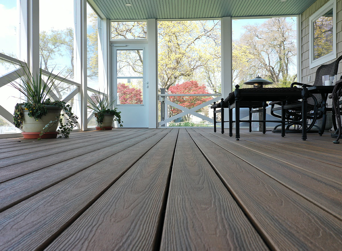 Covered porch featuring our Optima Dekk composite decking.